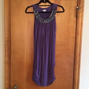 Adorable party dress with beaded detail!